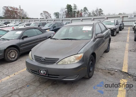 2002 Toyota Camry Le z USA, uszkodzony, nr VIN 4T1BE32K12U536831